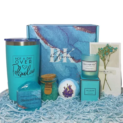  BRAND-NEW BOXED BE KURIOUS SPA PACKAGES THAT CONTAIN: 1X BATH BOMB, 1X DIAMOND SOAP, 1X BATH SALTS, 1X TUMBLER, 1X CANDLE AND 1X DRIED FLOWERS CARD.