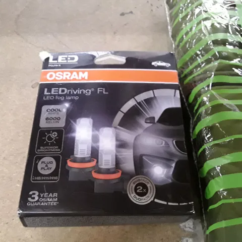 BAGGED PET GREEEN HARNESS AND A BOXED LED OSRAM FOG LAMP