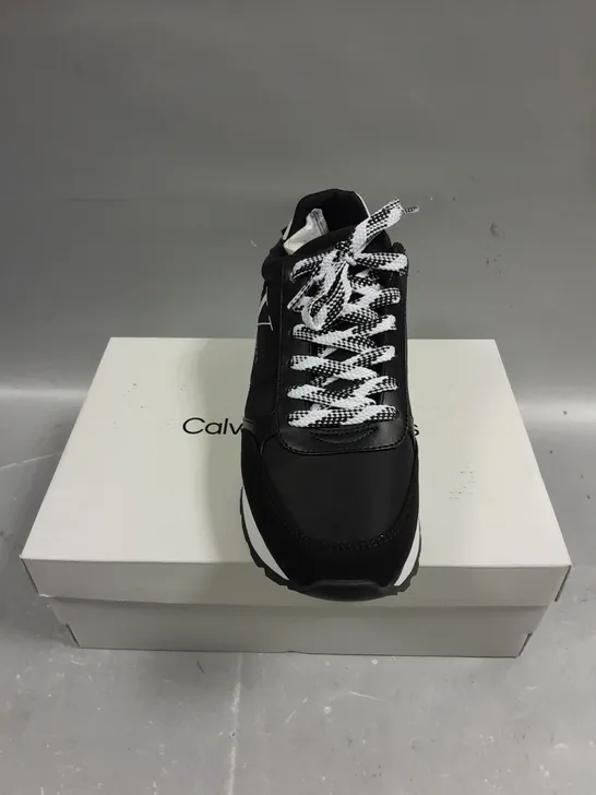 BOXED PAIR OF CALVIN KLEIN CAYLE BLACK FABRIC TRAINERS - 8