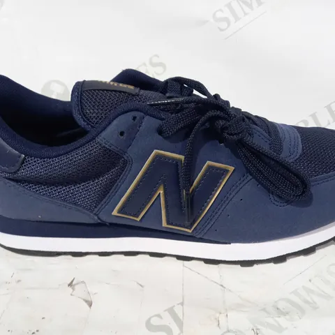 BOXED PAIR OF NEW BALANCE 500 TRAINERS IN NAVY UK SIZE 8