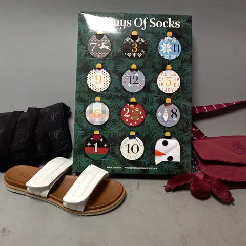 BOX OF APPROXIMATELY 10 ASSORTED ITEMS TO INCLUDE - KIPLING BAG , SANDALS , 12 DAYS OF SOCKS ETC