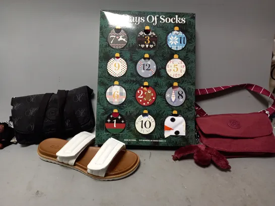 BOX OF APPROXIMATELY 10 ASSORTED ITEMS TO INCLUDE - KIPLING BAG , SANDALS , 12 DAYS OF SOCKS ETC