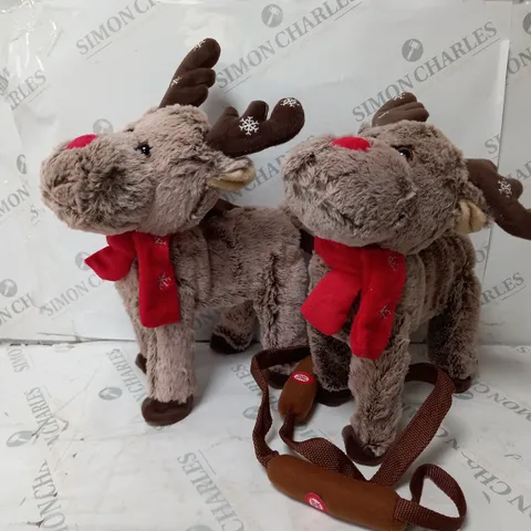 TWO BOXED ANIMATED WALKING AND SINGING REINDEER 