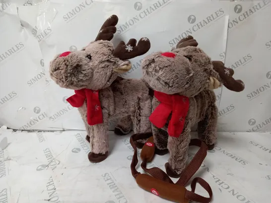 TWO BOXED ANIMATED WALKING AND SINGING REINDEER 