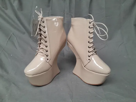 BOX OF APPROXIMATELY 10 BOXED PAIRS OF CASANDRA HIGH PLATFORM SHOES IN NUDE - VARIOUS SIZES