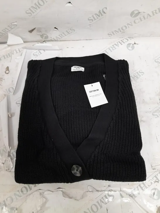 BOX OF APPROX 120 ASSORTED BRAND NEW RIBBED BLACK CARDIGANS IN VARIOUS SIZES - COLLECTION ONLY