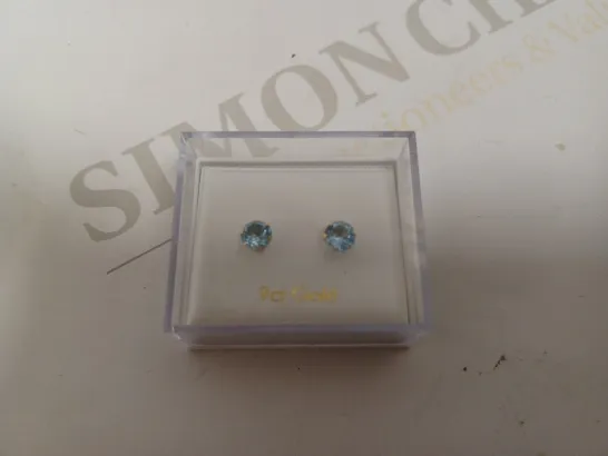 BOXED PAIR OF GOLD EFFECT STUD EARRINGS WITH BLUE STONES