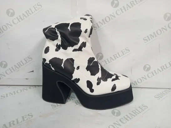 BOXED PAIR OF KOI PLATFORM BLOCK HEEL BOOTS IN COW SKIN PATTERN SIZE 6