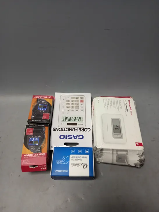 APPROXIMATELY 10 ASSORTED ELECTRICAL PRODUCTS TO INCLUDE DIGITAL TUNER , PULSE OXIMETER , CALCULATOR , ETC 