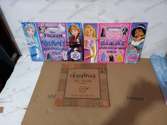 LOT OF 3 ASSORTED TOY/GAME ITEMS TO INCLUDE DISNEY FROZEN GIANT COLOUR-ME PAD, DISNEY PRINCESS GIANT COLOUR-ME PAD AND CHRISTMAS KRAFT COLLECTION PAPER PACK