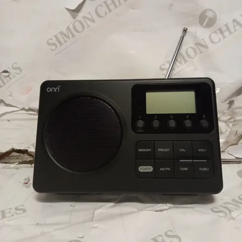 ON PORTABLE AM/FM RADIO