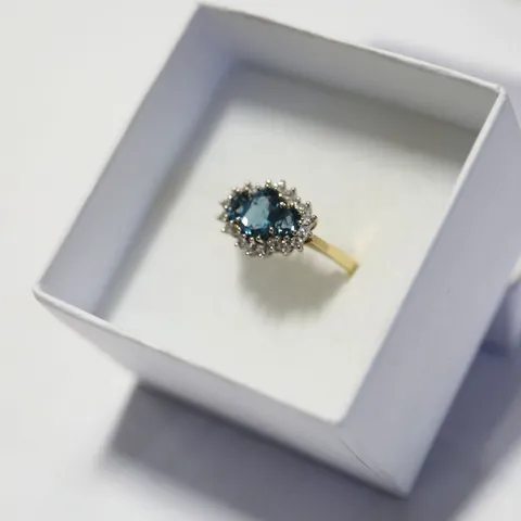 18CT GOLD DIAMOND AND AQUAMARINE DRESS RING