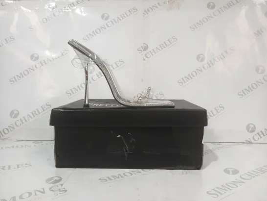BOXED PAIR OF PRETTY LITTLE THING WIDE FIT OPEN SQUARE TOE STRAP HIGH HEEL SHOES IN METALLIC SILVER W. JEWEL EFFECT SIZE 6
