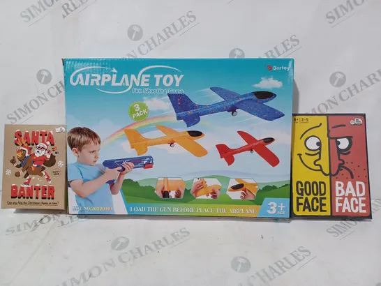 BOX OF APPROXIMATELY 20 ASSORTED TOYS AND GAMES TO INCLUDE GOOD FACE BAD FACE, AIRPLANE TOY SHOOTING GAME, SANTA BANTER, ETC