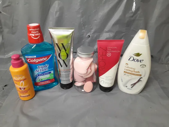 APPROXIMATELY 20 ASSORTED COSMETICS PRODUCTS TO INCLUDE - COLGATE MOUTHWASH, DOVE CARING BATH AND BEAUTY BLENDERS ETC. 