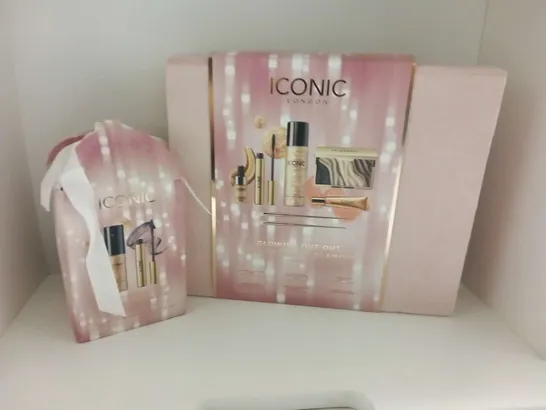 TWO ASSORTED ICONIC BEAUTY PRODUCTS TO INCLUDE; GLOWING OUT-OUT AND ALL WRAPPED UP