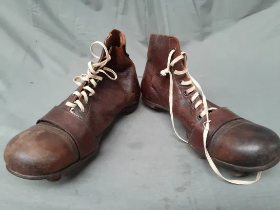 PAIR OF VINTAGE 1934 LEATHER FOOTBALL BOOTS SIZE 6.5