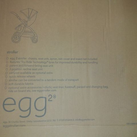 BOXED EGG 2 CHASSIS WITH SEAT UNIT, APRON AND RAIN COVER 