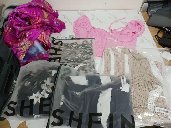 LARGE BOX OF ASSORTED CLOTHING ITEMS IN VARIOUS COLOURS AND SIZES INCLUDING TROUSERS , TOPS AND JUMPERS 