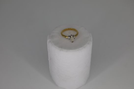 18CT GOLD SOLITAIRE RING SET WITH A MARQUIS CUT DIAMOND WEIGHING +0.72CT RRP £1900