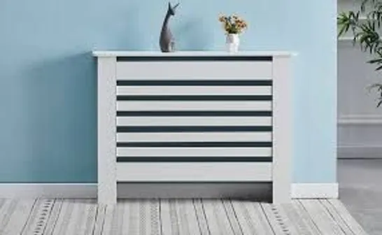 A BOXED OFCASA WHITE WOODEN RADIATOR COVER