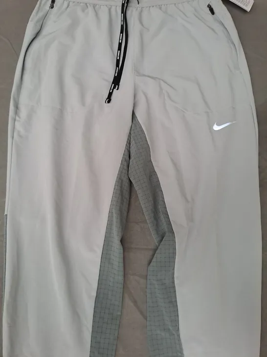 NIKE DRI-FIT PANTS IN GREY SIZE SMALL