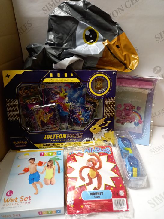 LOT OF ASSORTED ITEMS TO INCLUDE POKEMON TRADING GAME JOLTEON VMAX PREMIUM COLLECTION, KIDS SWIMMING GOOGLES, INTEX KIDS INFLATABLE ARM BANDS, MONKEY INFLATABLE TOY ETC. 
