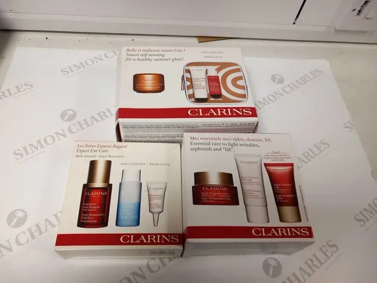 3 ASSORTED CLARINS PARIS PRODUCTS TO INCLUDE; EXPERT EYE CAR, ESSENTIAL CARE TO FIGHT WRINKLES REPLENISH AND LIFT AND SMART TANNING FOR A HEALTHIER GLOW