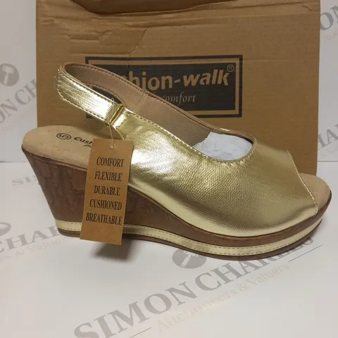 BOXED PAIR OF CUSHION WALK GOLD WEDGE HEEL SHOES IN GOLD - SIZE 5