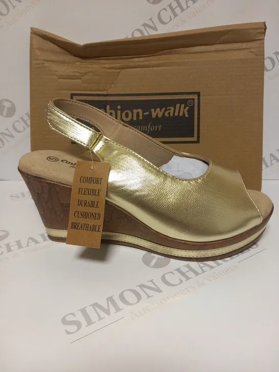 BOXED PAIR OF CUSHION WALK GOLD WEDGE HEEL SHOES IN GOLD - SIZE 5