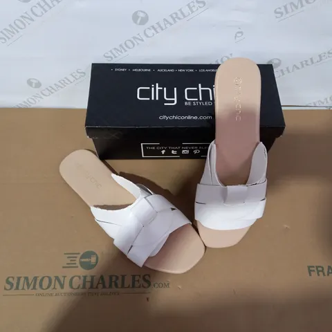 BOXED PAIR OF CITY CHIC WHITE SLIDERS SIZE 44