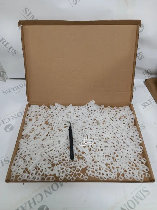 10 BOXED TILE SPACERS (APPROXIMATELY 300 PER BOX)