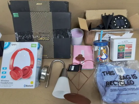 LOT OF ASSORTED HOUSEHOLD ITEMS TO INCLUDE SOLAR LIGHTS, PROTECTIVE IPAD CASES AND WIRELESS HEADPHONES
