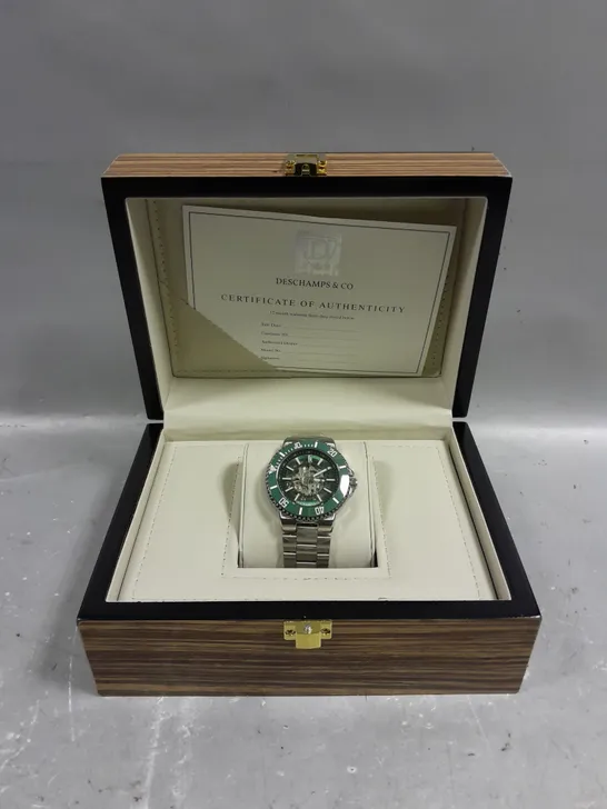 BOXED DESCHAMPS & CO AUTOMATIC WATCH GREEN SKELETON DIAL STAINLESS STEEL STRAP 