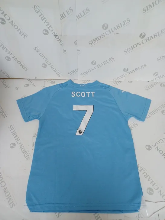 MANCHESTER CITY FC HOME SHIRT AND SHORTS WITH SCOTT 7 ON THE BACK SIZE 24