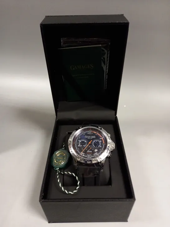 BOXED GAMAGES MECHANICAL RACER STEEL WATCH 