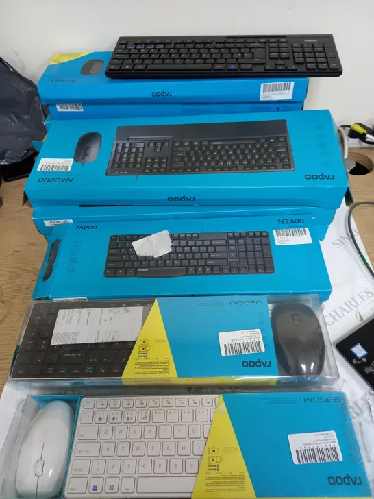 APPRROXIMETELY 13 ASSORTED RAPOO KEYBOARDS, SOME INCLUDING A MOUSE