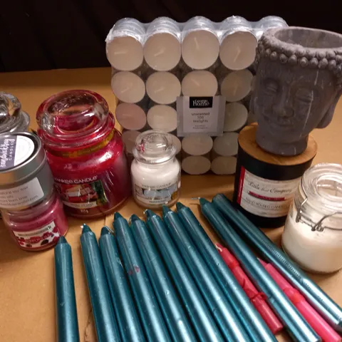 LOT OF ASSORTED CANDLES TO INCLUDE 411G YANKEE CANDLES AND 100-PACK OF TEALIGHTS