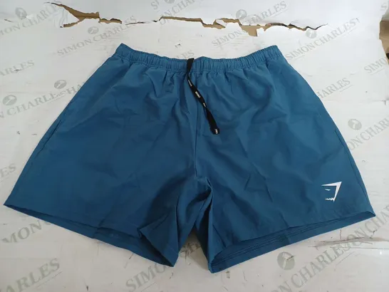 GYMSHARK ARRIVAL 5 SHORTS IN BLUE - MEDIUM