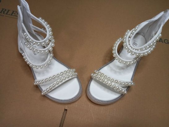 PAIR OF DESIGNER IVORY/PEARL DETAILED ANKLE SANDALS - SIZE 3