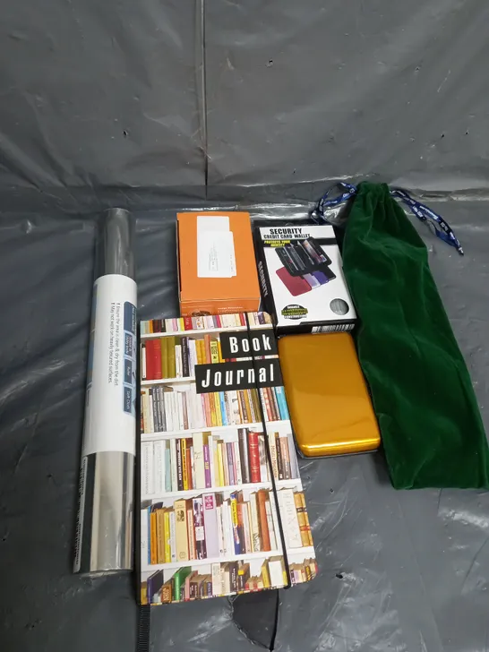 APPROXIMATELY 10 ASSORTED HOUSEHOLD ITEMS TO INCLUDE BOOK JOURNAL , CREDIT CARD WALLET , INSTALLATION , ETC 