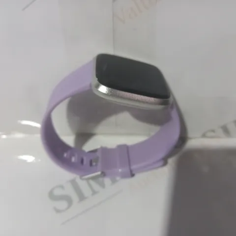 BOXED FITBIT VERSA LITE EDITION SMARTWATCH IN LILAC COLOUR