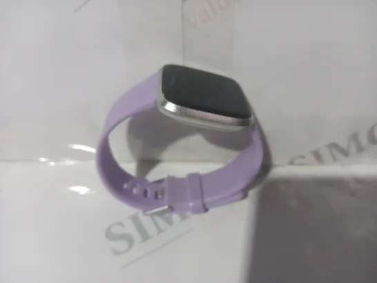 BOXED FITBIT VERSA LITE EDITION SMARTWATCH IN LILAC COLOUR