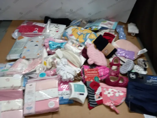 LOT OF ASSORTED CHILDRENS CLOTHING ACCESSORIES AND PACKAGED CLOTHING ITEMS