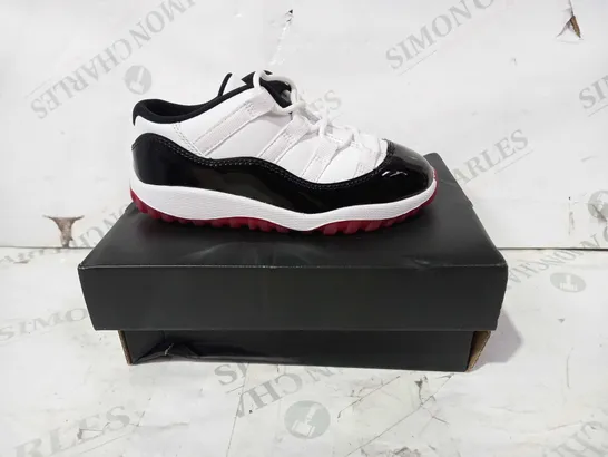 BOXED PAIR OF NIKE AIR JORDAN 11 RETRO LOW IN WHITE/BLACK/RED UK SIZE 9.5C