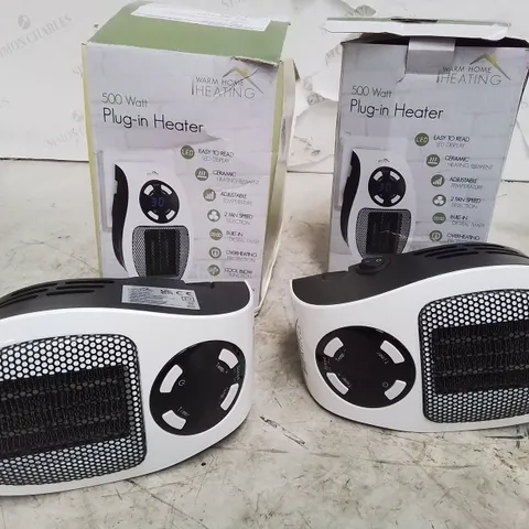 TWO BOXED 500 WATT PLUG IN HEATERS 