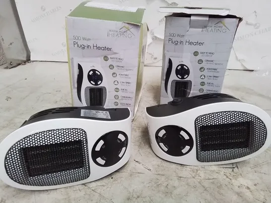 TWO BOXED 500 WATT PLUG IN HEATERS 