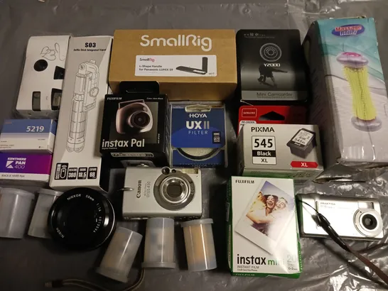 LOT OF APPROXIMATEY 15 ASSORTED CAMERAS AND ACCESSORIES TO INCLUDE FUJIFILM INSTAX MINI, SELFIE STICK TRIPOD AND CANON CAMERA 