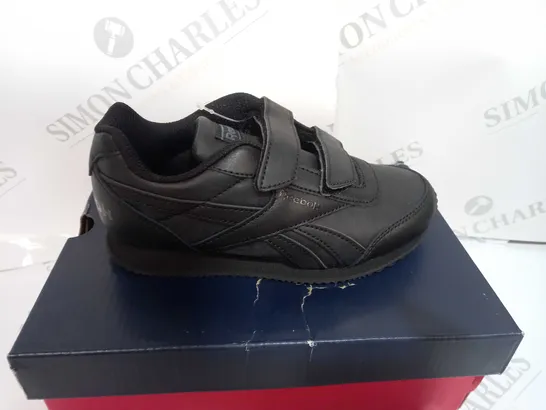 BOXED PAIR OF KIDS REEBOK ROY IN BLACK SIZE 12.5 