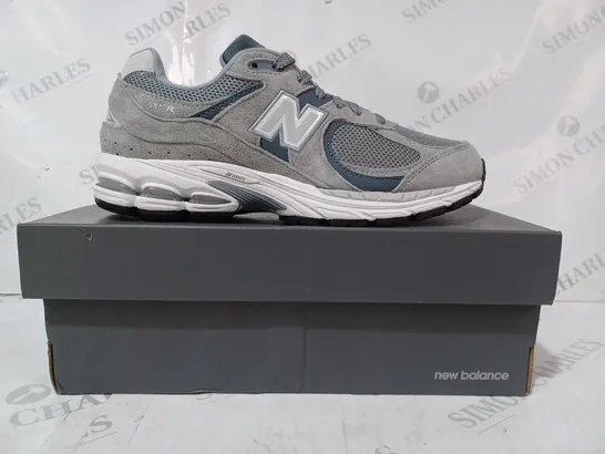 BOXED PAIR OF NEW BALANCE TRAINERS IN GREY UK SIZE 6